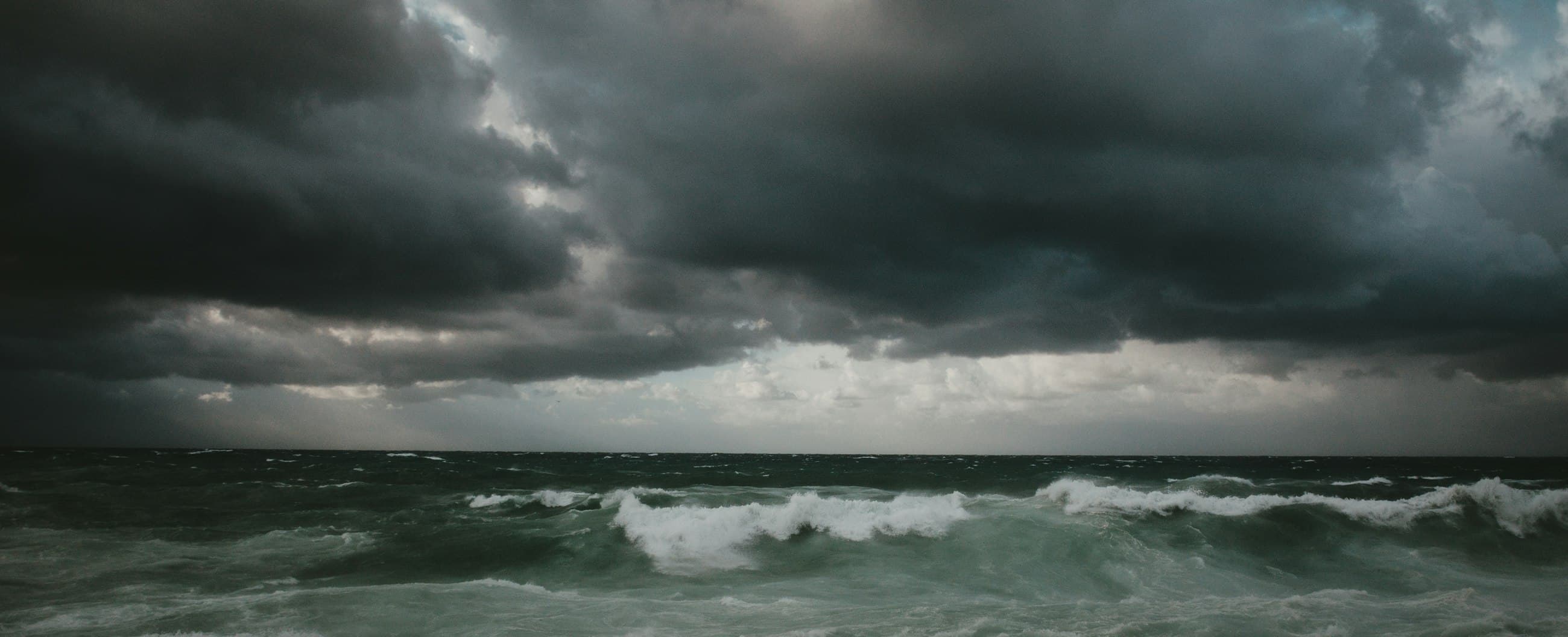 Storm clouds over a dark sea